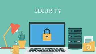un bureau avec divers documents et un PC portable avec le mot sécurité